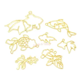Goldfish Theme Open Bezel Charms (7 pieces)